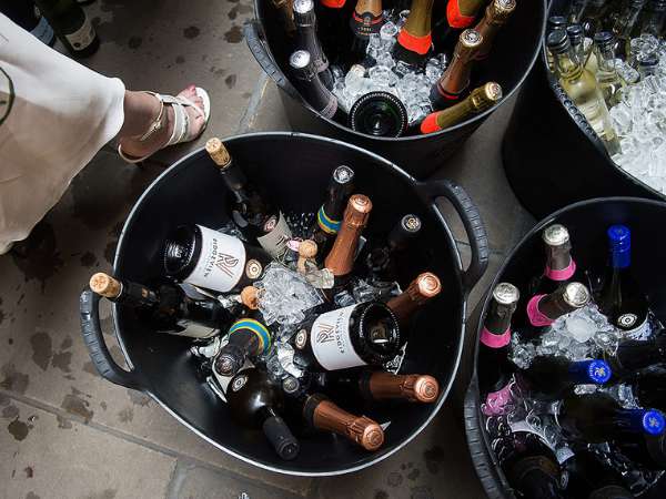 Image showing ice buckets filled with bottles of sparkling wine and ice