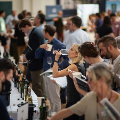 Picture of people tasting wine at a trade tasting event